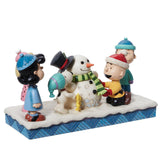 Jim Shore - Peanuts Gang Building Snowman Figurine